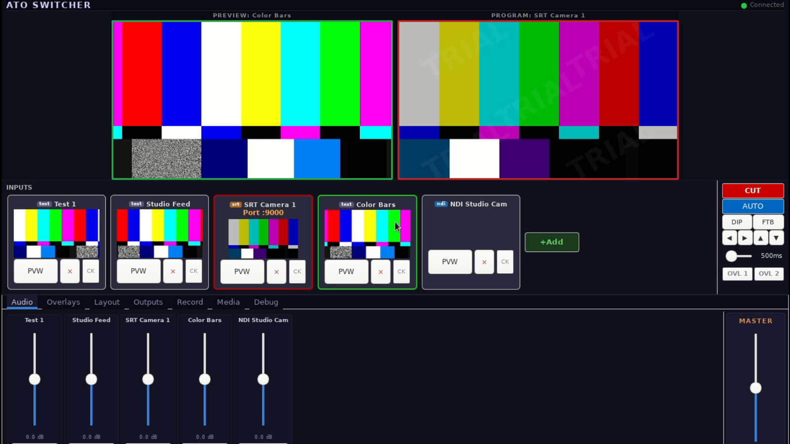 Ato Switcher mixer desktop with preview and program monitors, input tiles, transition controls, and audio faders